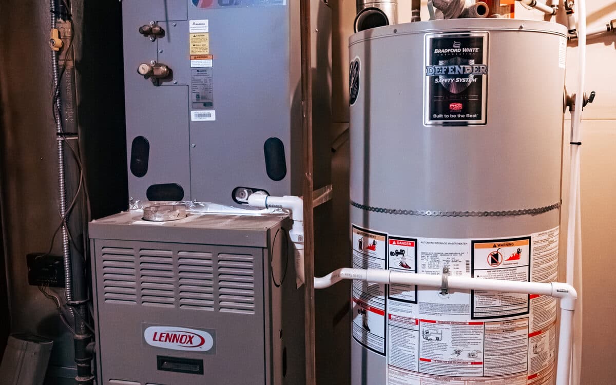 Furnace and air handler being serviced — HVAC installation in West Vancouver, BC by DirectBuy Furnace