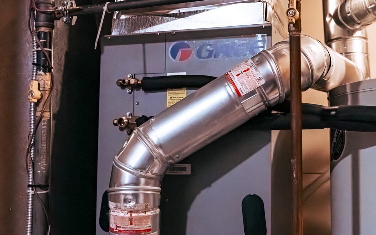 Mechanical-room boiler and venting — Boiler Installation & Service completed in Coquitlam, BC by DirectBuy Furnace