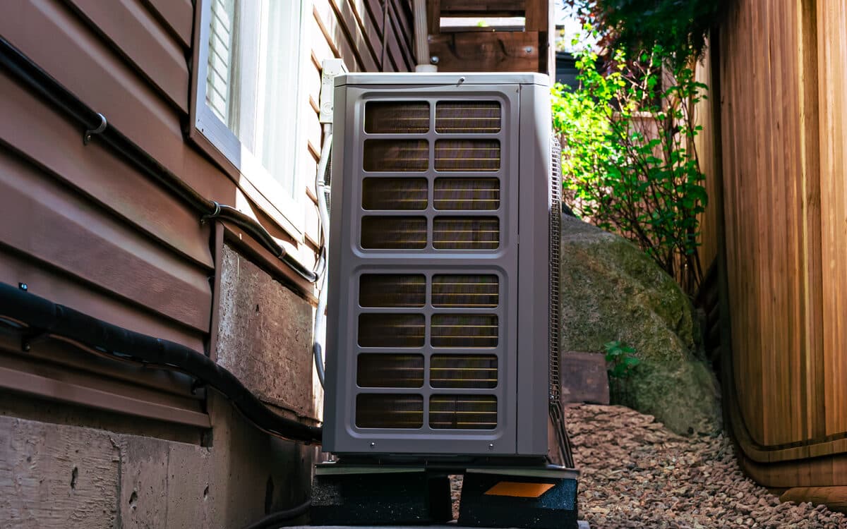 Cooling system installed beside a home — AC Installation completed in Abbotsford, BC by DirectBuy Furnace